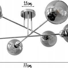 Nowoczesna lampa z sześcioma szklanymi kulami w chromie. Jej futurystyczny design doda blasku każdemu wnętrzu.